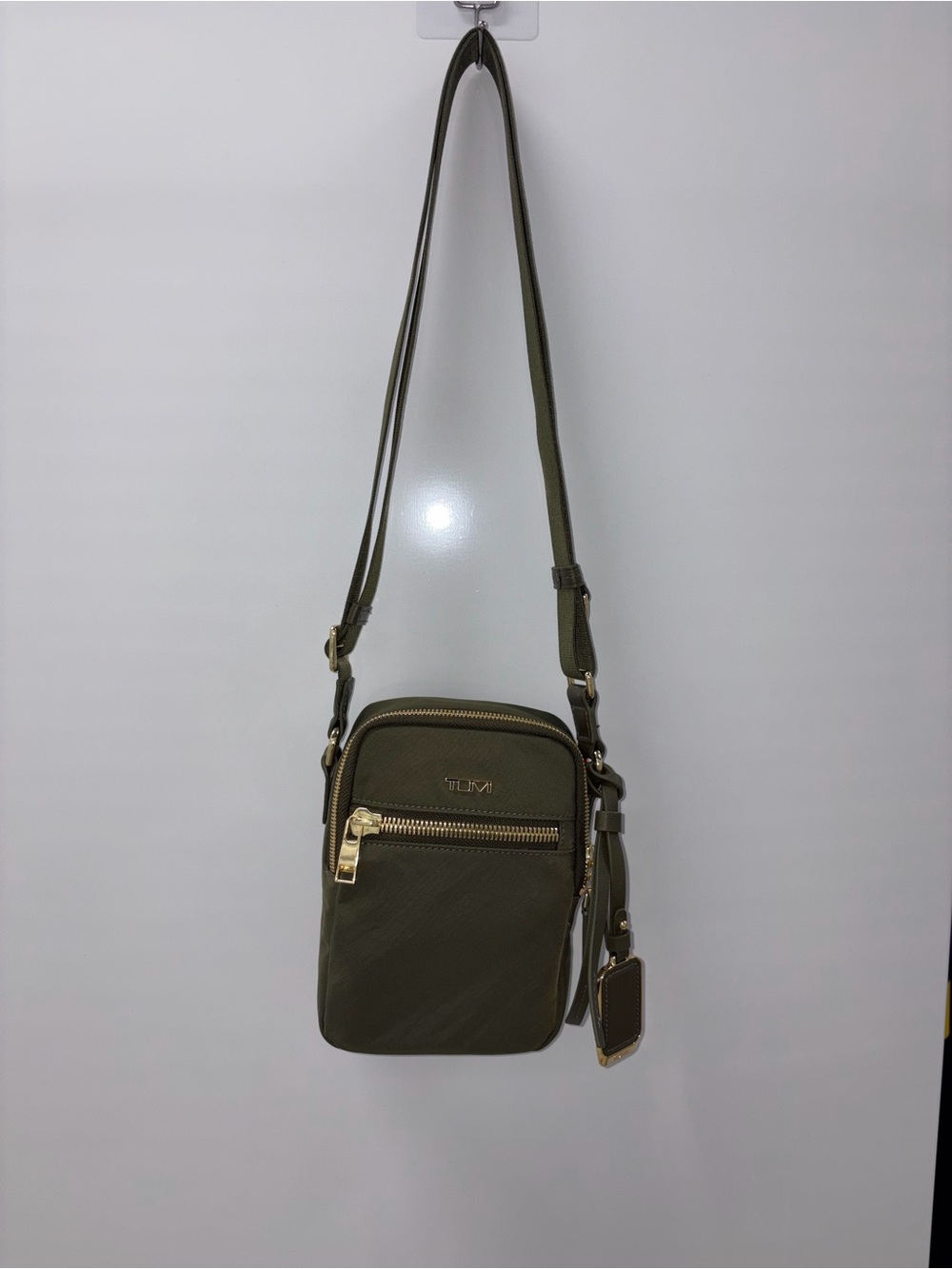 Tumi VOYAGER Olive Green Compact Crossbody with Gold Hardware